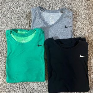 Three men’s Nike athletic shirts, barely used, size L